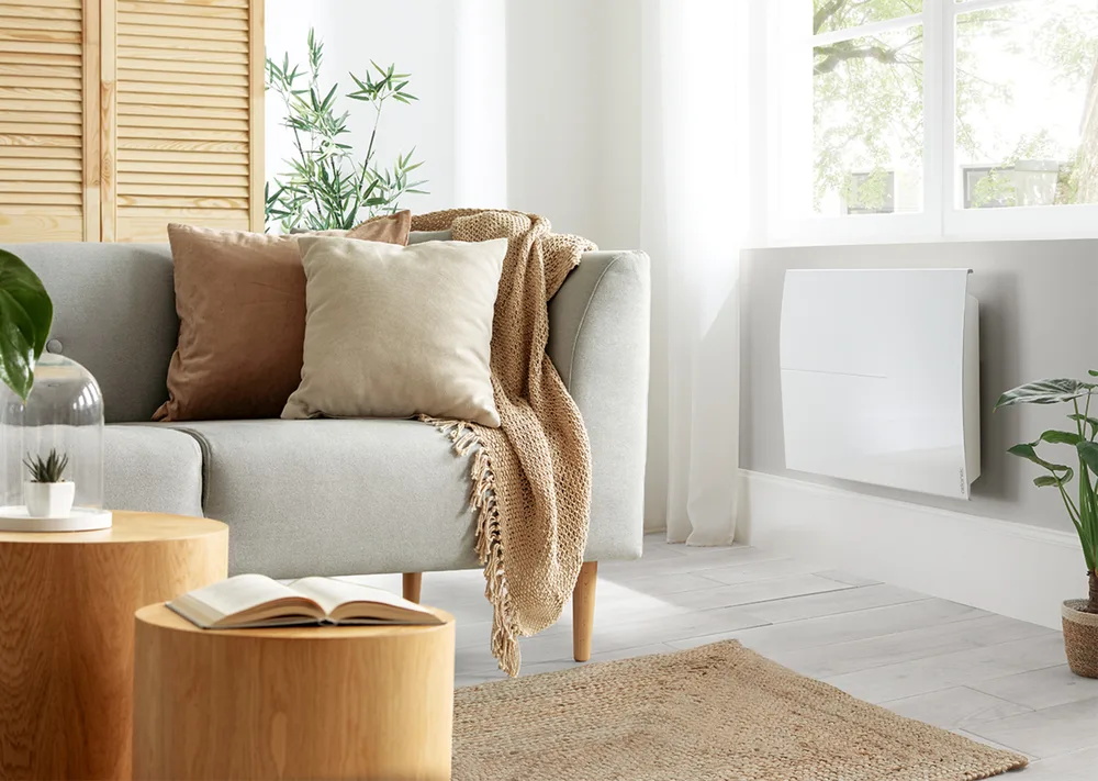 Atlantic smart electric radiator, sized per room and scheduled independently.