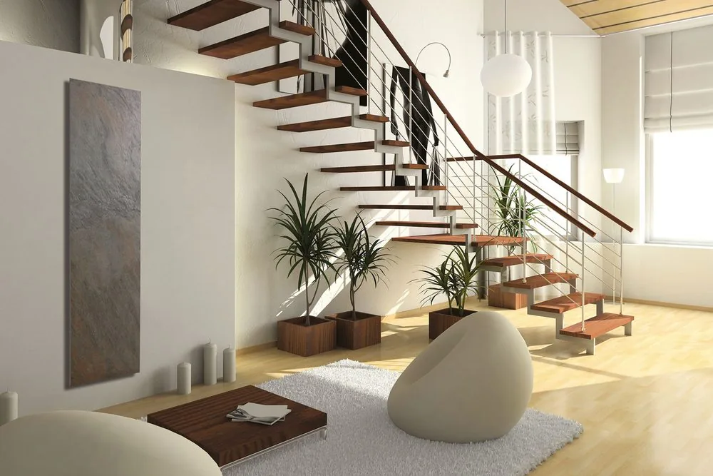 Beside a staircase, where a conventional radiator has nowhere to sit and a tall slim panel does.